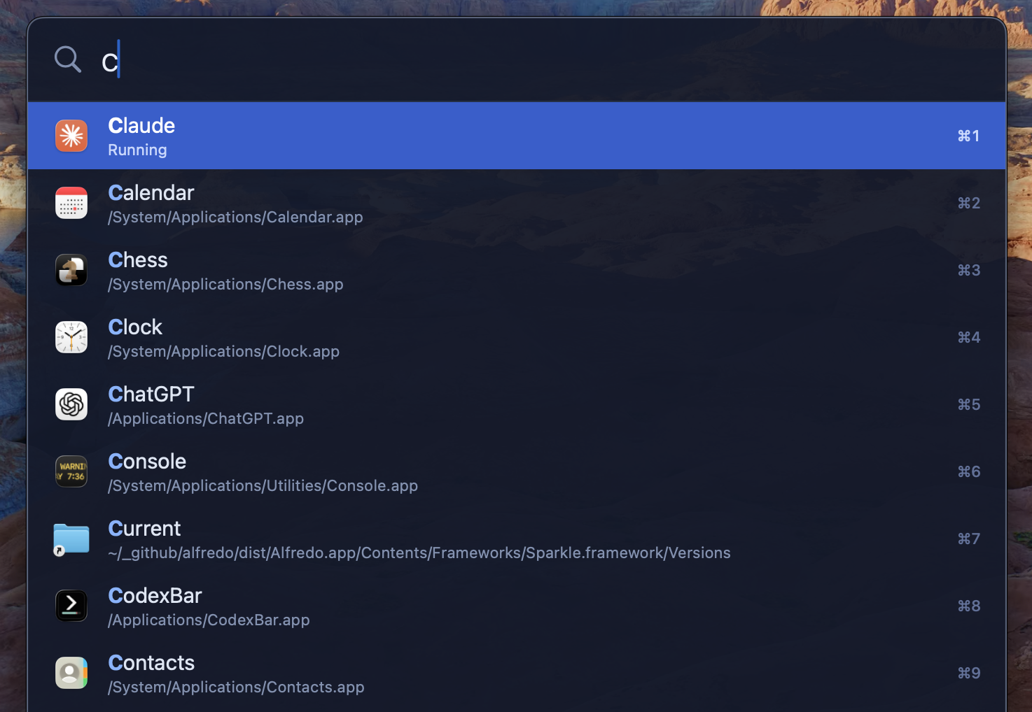 The Alfredo search bar with the letter c typed in and Claude, Calendar, Chess and Clock in the results